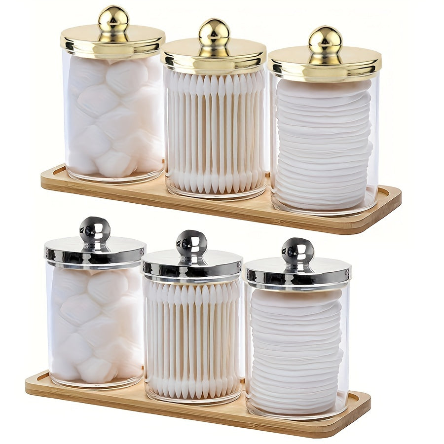 3-piece Qtip holder with tray, acrylic apothecary jars and lids for bathroom storage.