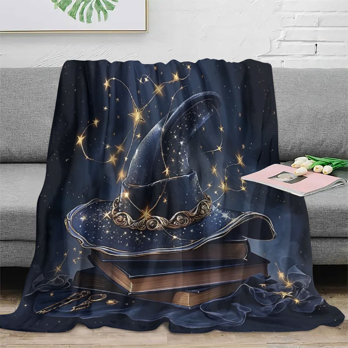 Get in the Halloween spirit with our 1 piece large book and witch hat design printed throw blanket. Made of soft flannel fleece, it is perfect for using on your sofa, bed, or while traveling or camping. This blanket is also great for adding a cozy touch