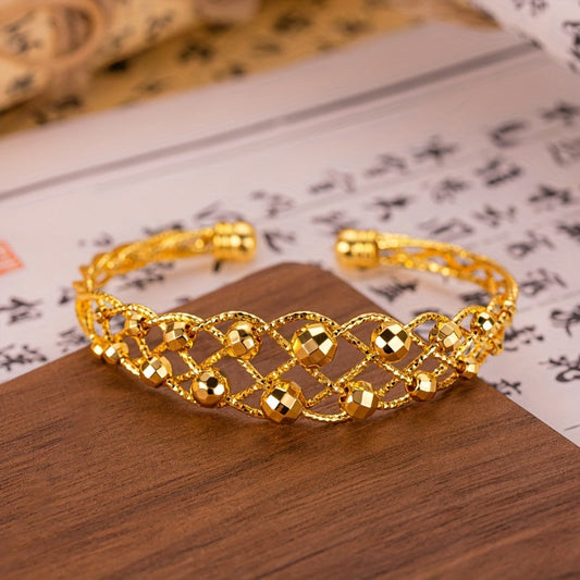 Make a statement with our Boho Luxury 24K Gold Plated Copper Cuff Bracelet, an adjustable open bangle featuring a shiny weave design. This stunning piece is perfect for any occasion, whether it be a party, wedding, or a Mother's Day gift. Elevate your