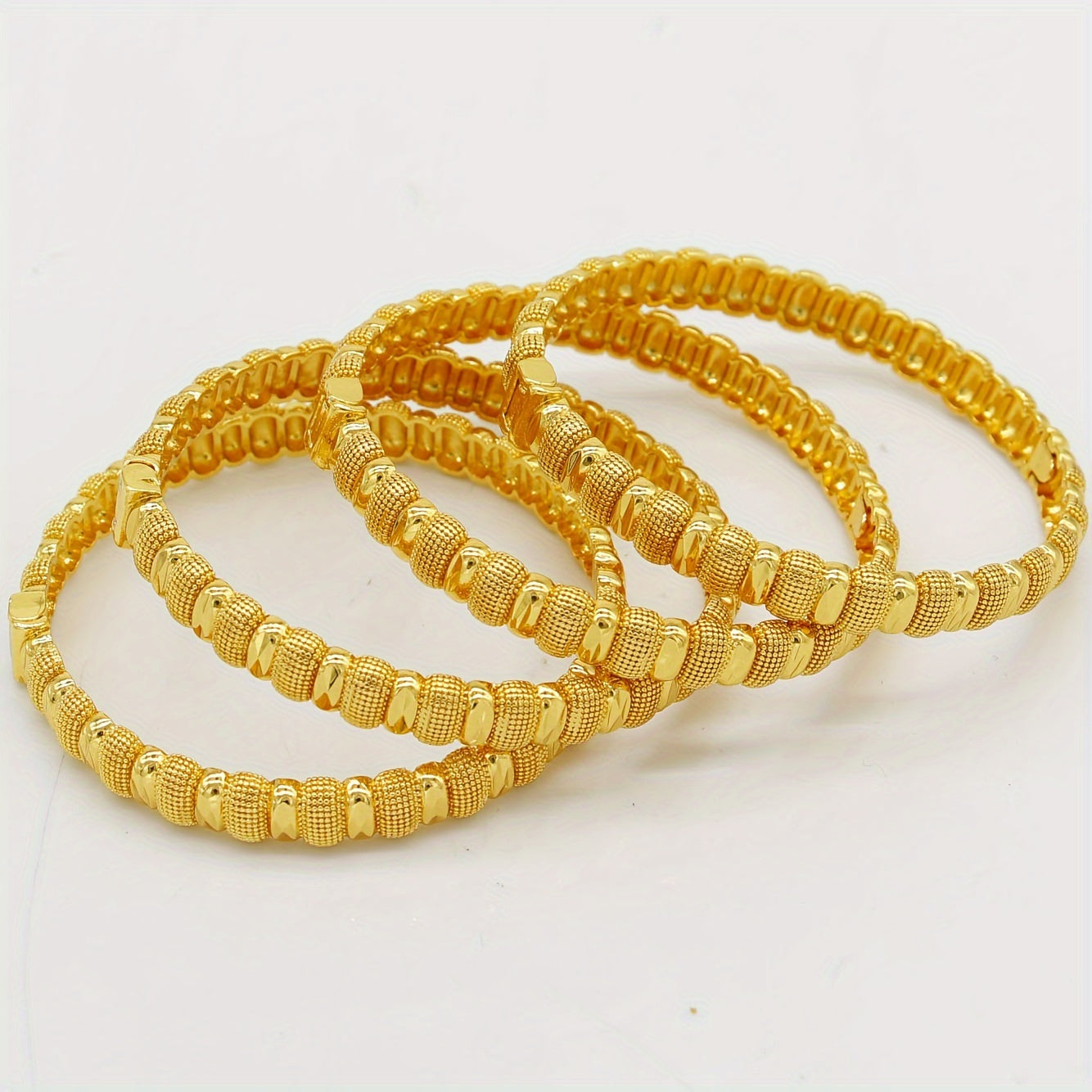 Set of 4 Luxe Gold-Plated Copper Bangles - Timeless Stacking Style for Women, Ideal for Everyday Wear & Gifts