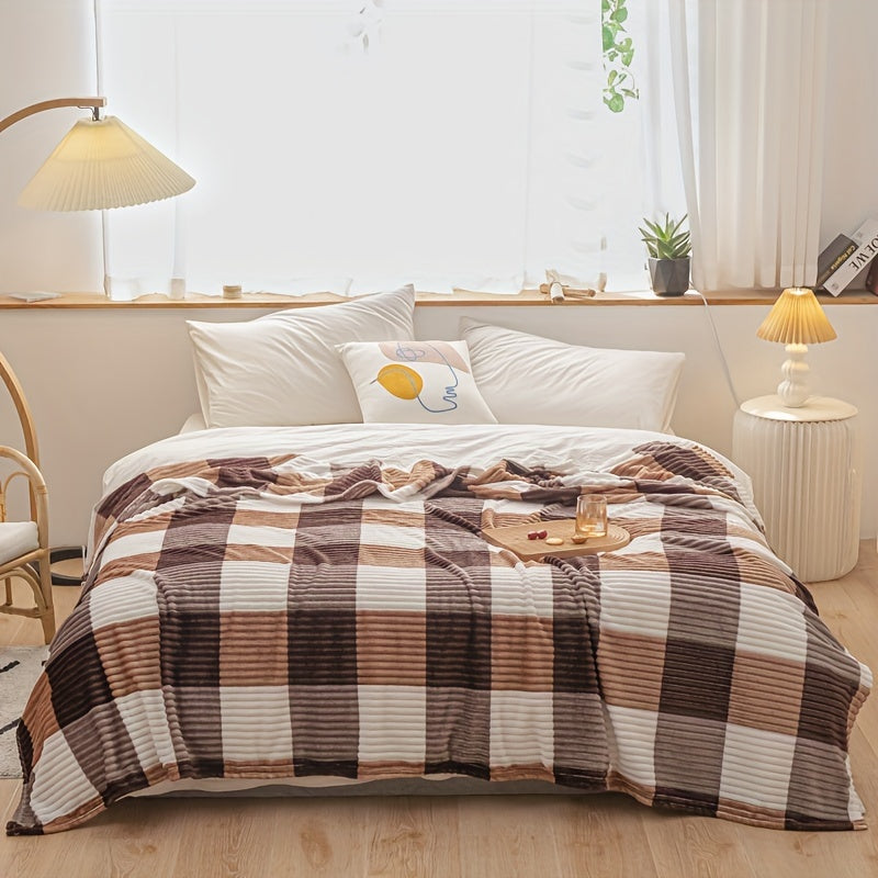 A cozy fleece blanket with whimsical stripes, ideal for snuggling up at work or having a quick snooze.