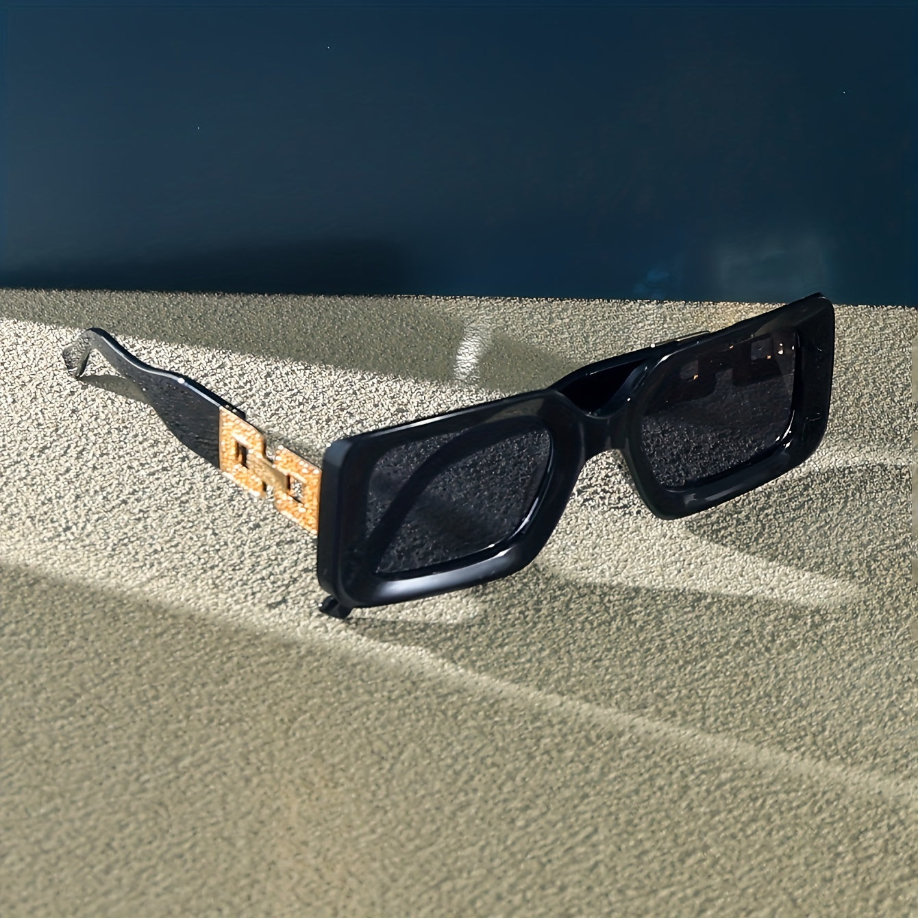 Fashionable square glasses with plastic frames and anti-reflective lenses, perfect for beach and travel.