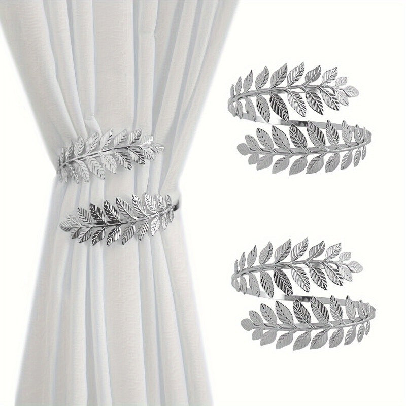 Add a touch of elegance to your living space with the Stunning Metal Leaf Curtain Clip Holder. This decorative curtain strap is perfect for adding a stylish finishing touch to your living room, bedroom, or office decor.