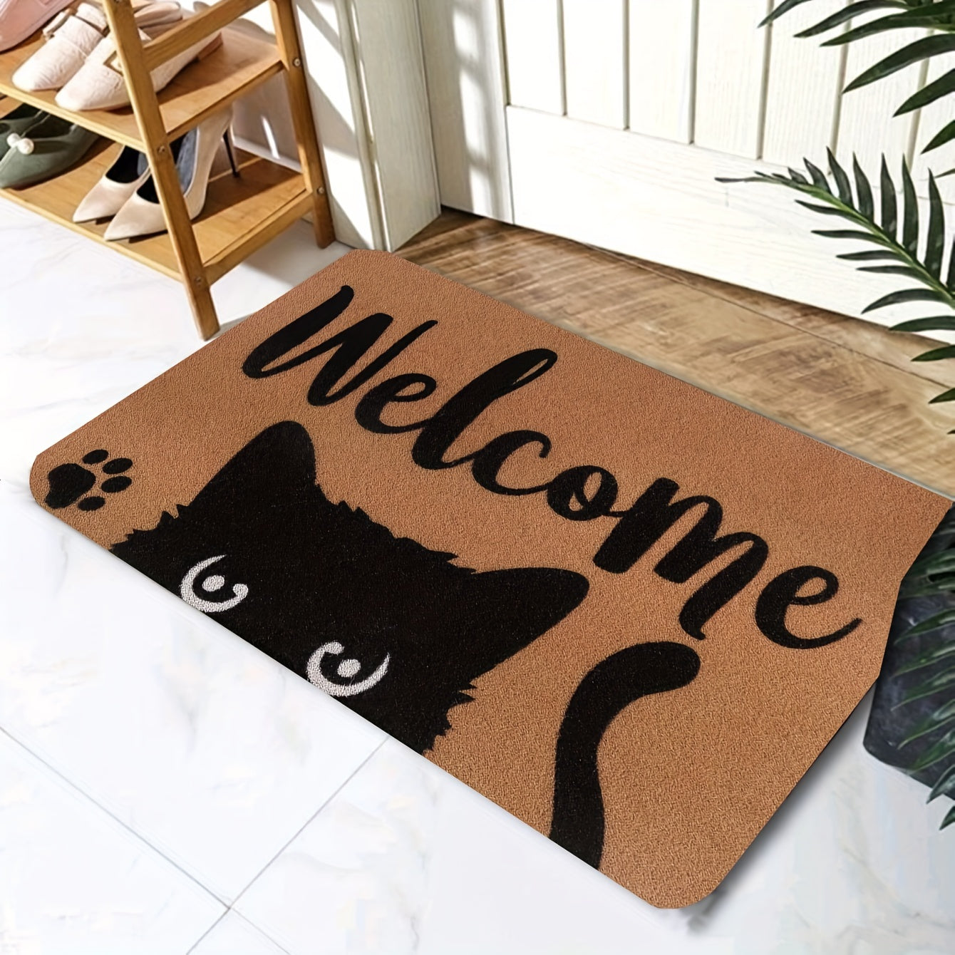 Introducing our Cat Welcome Doormat, featuring a non-slip backing for safety. Made from machine washable polyester, this indoor/outdoor rug is perfect for any entrance, porch, laundry room, or office. The fun cat design adds a whimsical touch to your