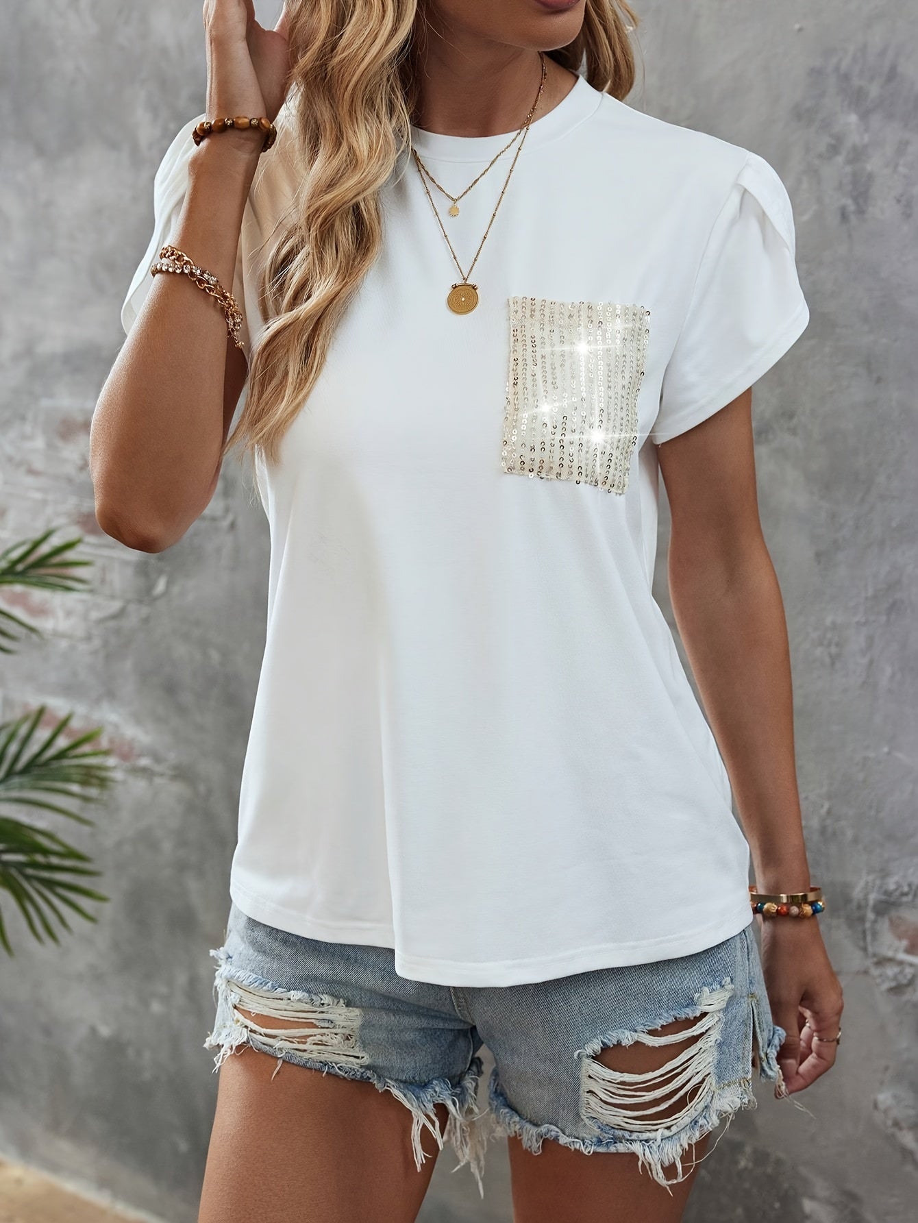 Women's Summer Fashion Sequined Petal Sleeve T-Shirt, made of 95% Polyester and 5% Elastane, with a Crew Neck and Solid Color. This Knit Fabric top is of Regular Length and Lightweight at