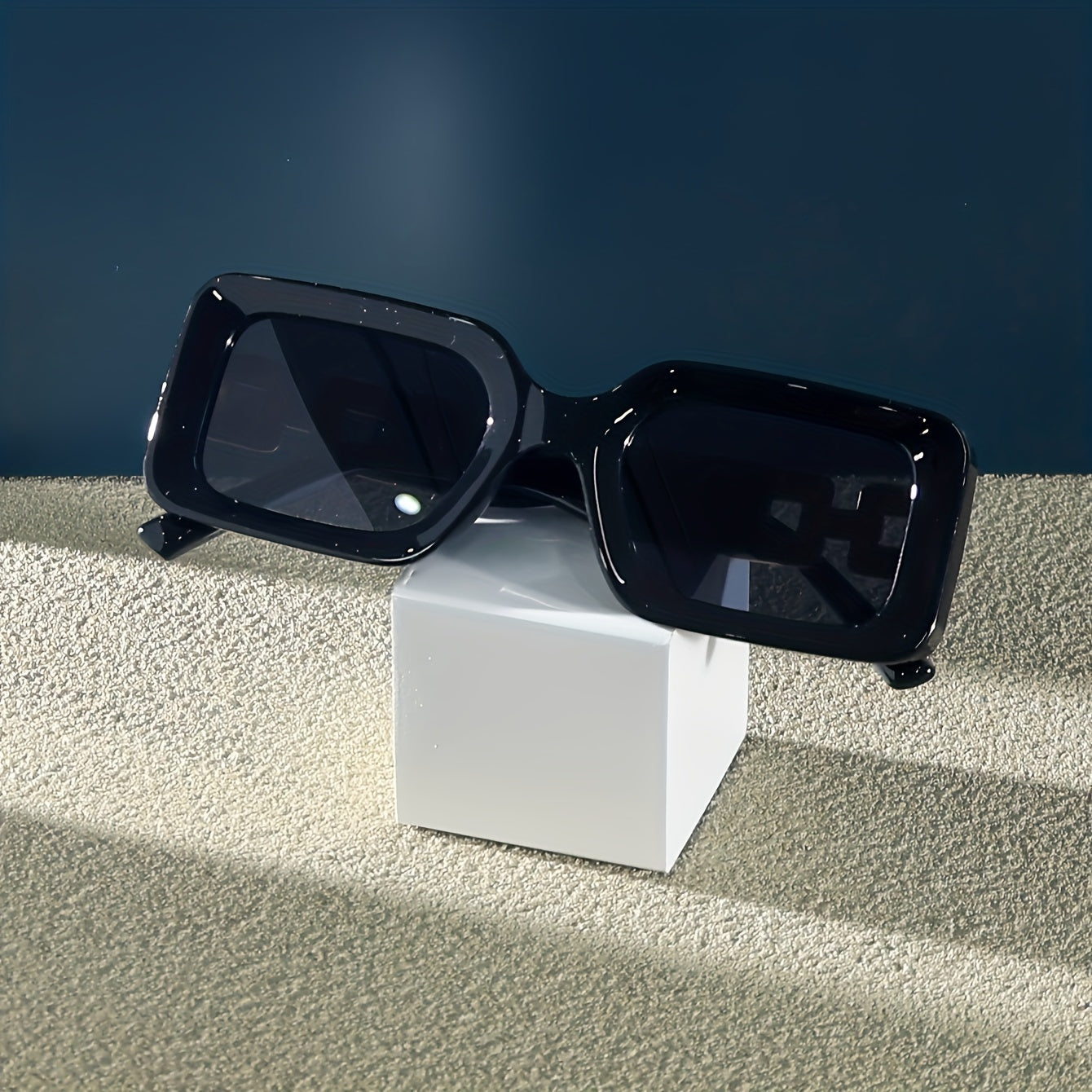 Fashionable square glasses with plastic frames and anti-reflective lenses, perfect for beach and travel.