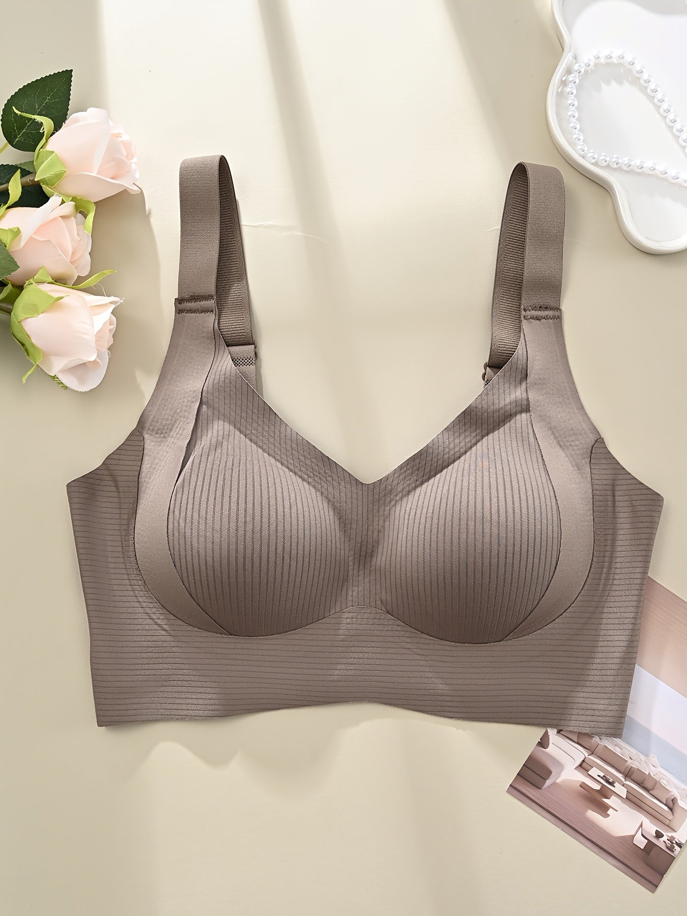 Elegant seamless wireless bralette with soft support and wide straps for comfortable daily wear.