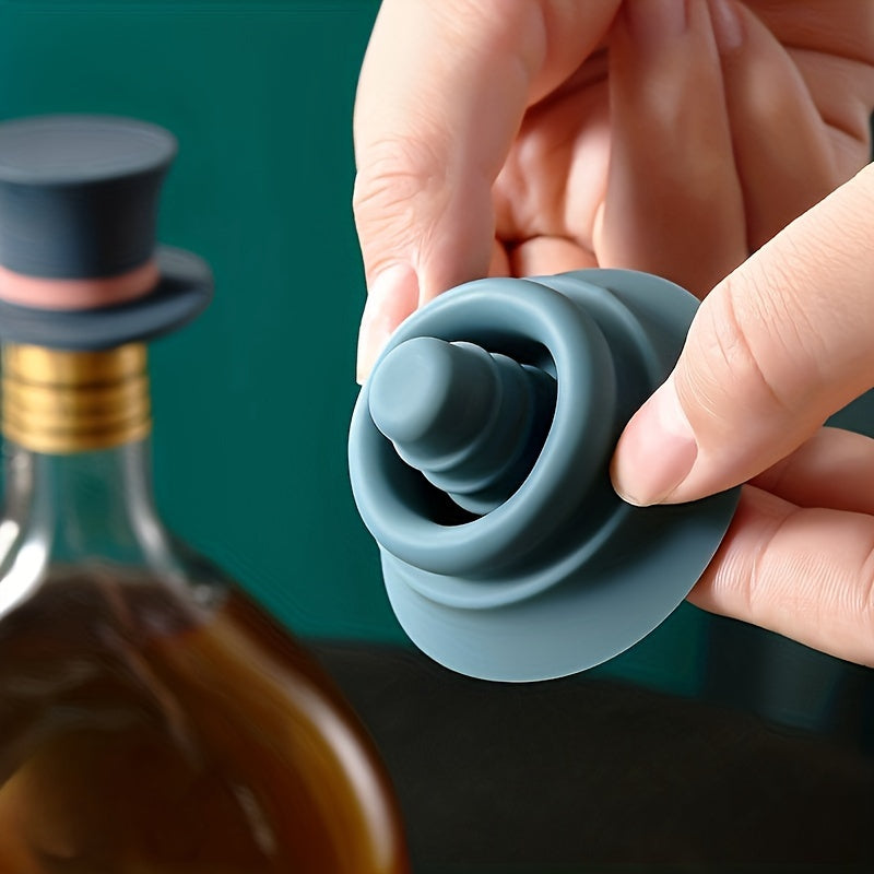 Silicone wine bottle stopper for red and champagne bottles to keep them fresh and dust-free.