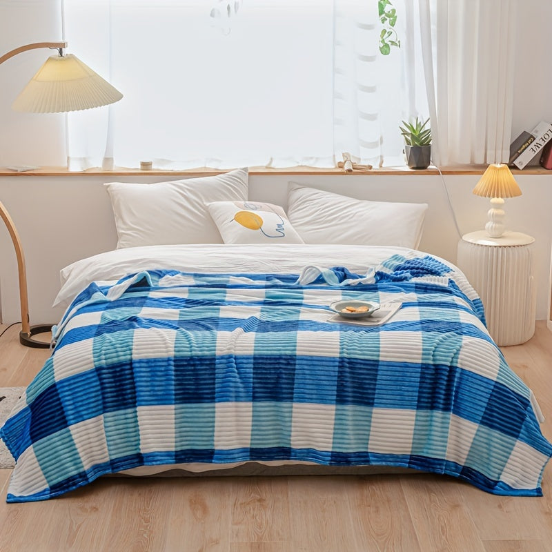 A cozy fleece blanket with whimsical stripes, ideal for snuggling up at work or having a quick snooze.