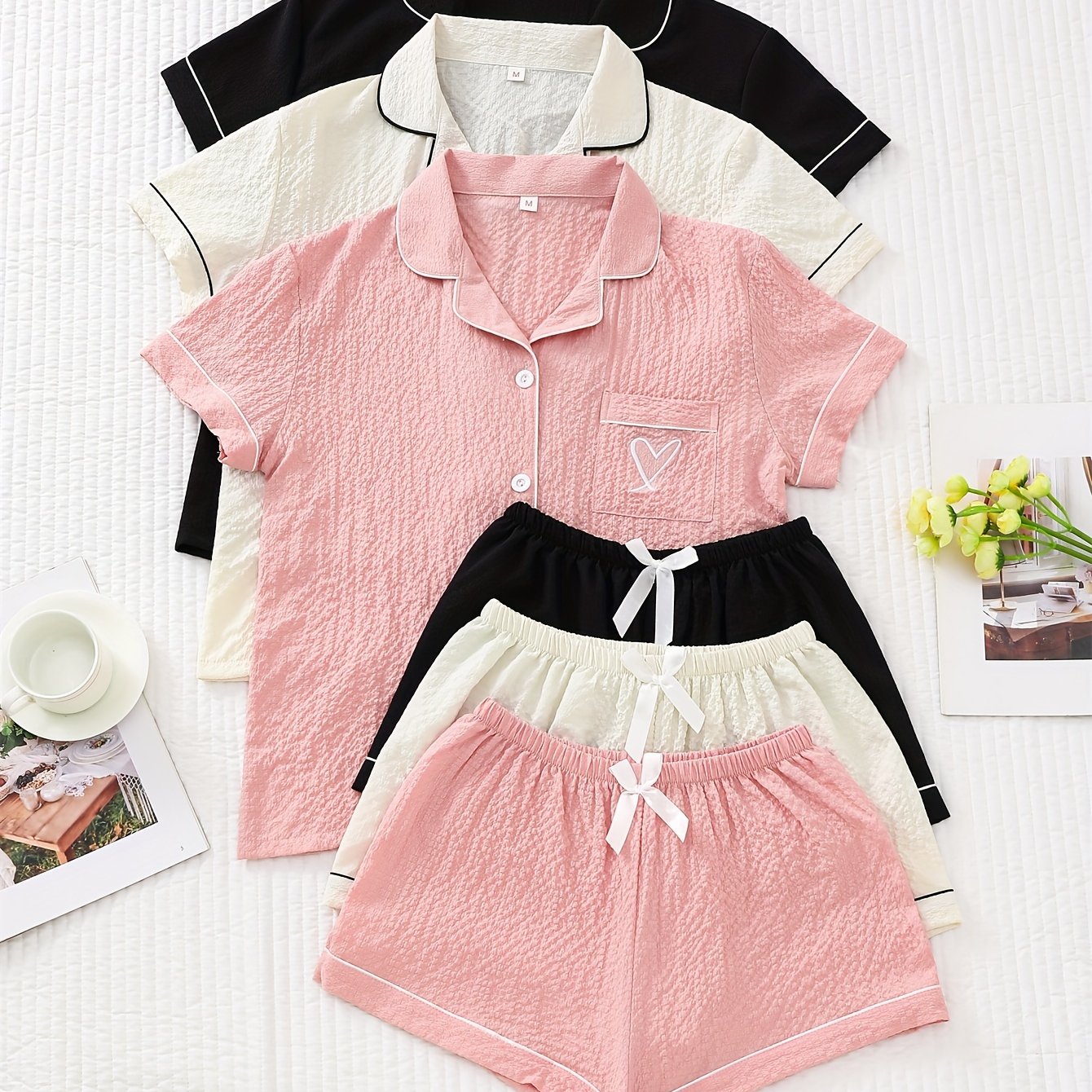 3-piece set of summer pajamas: Hemmed contrast color collar top with pocket embroidery, button closure, and bow shorts for women.