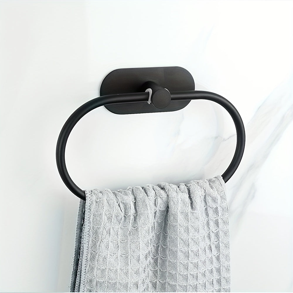 Self-adhesive stainless steel bathroom accessories for towel and dishcloth storage.