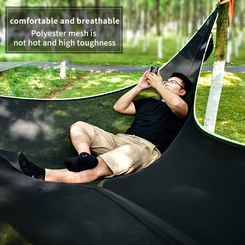 Large triangular hammock made of durable polyester fabric, easy to assemble with no power needed. Ideal for camping and outdoor relaxation.