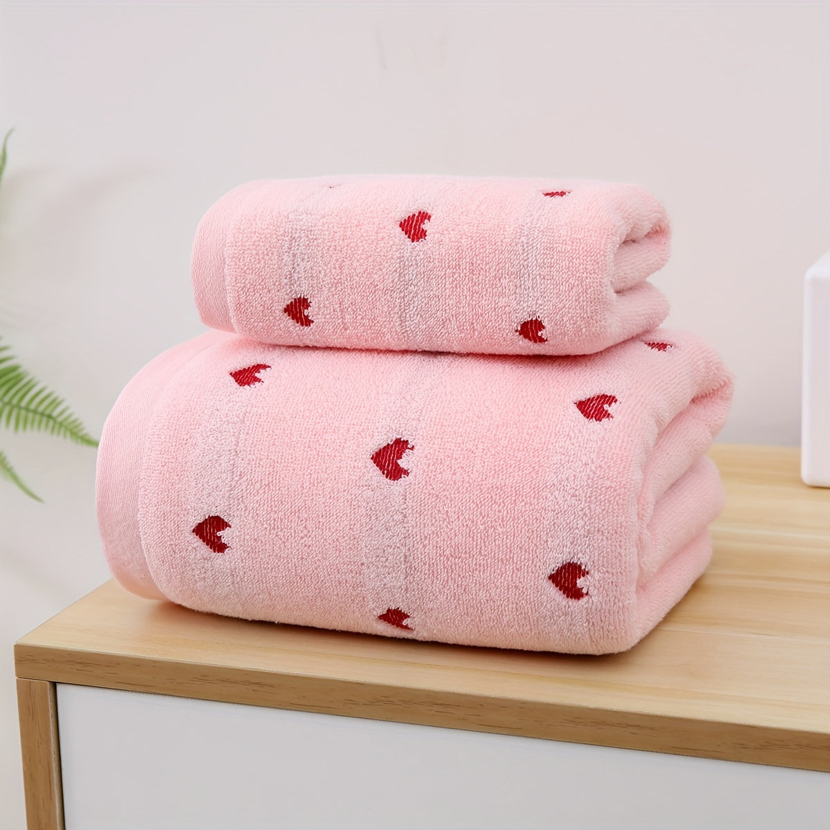 Two-piece set of bath towel and velvet face towel made of pure cotton with thickened absorbent peach heart style, ideal for home use.