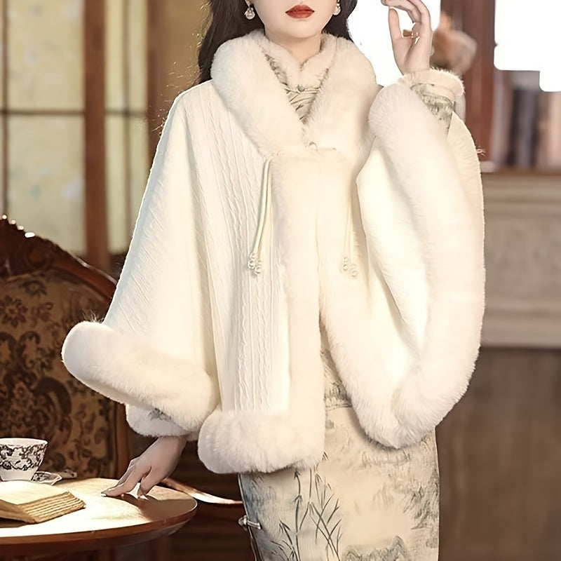 Elegant white faux fur cape with pearl accents, ideal for autumn/winter occasions.