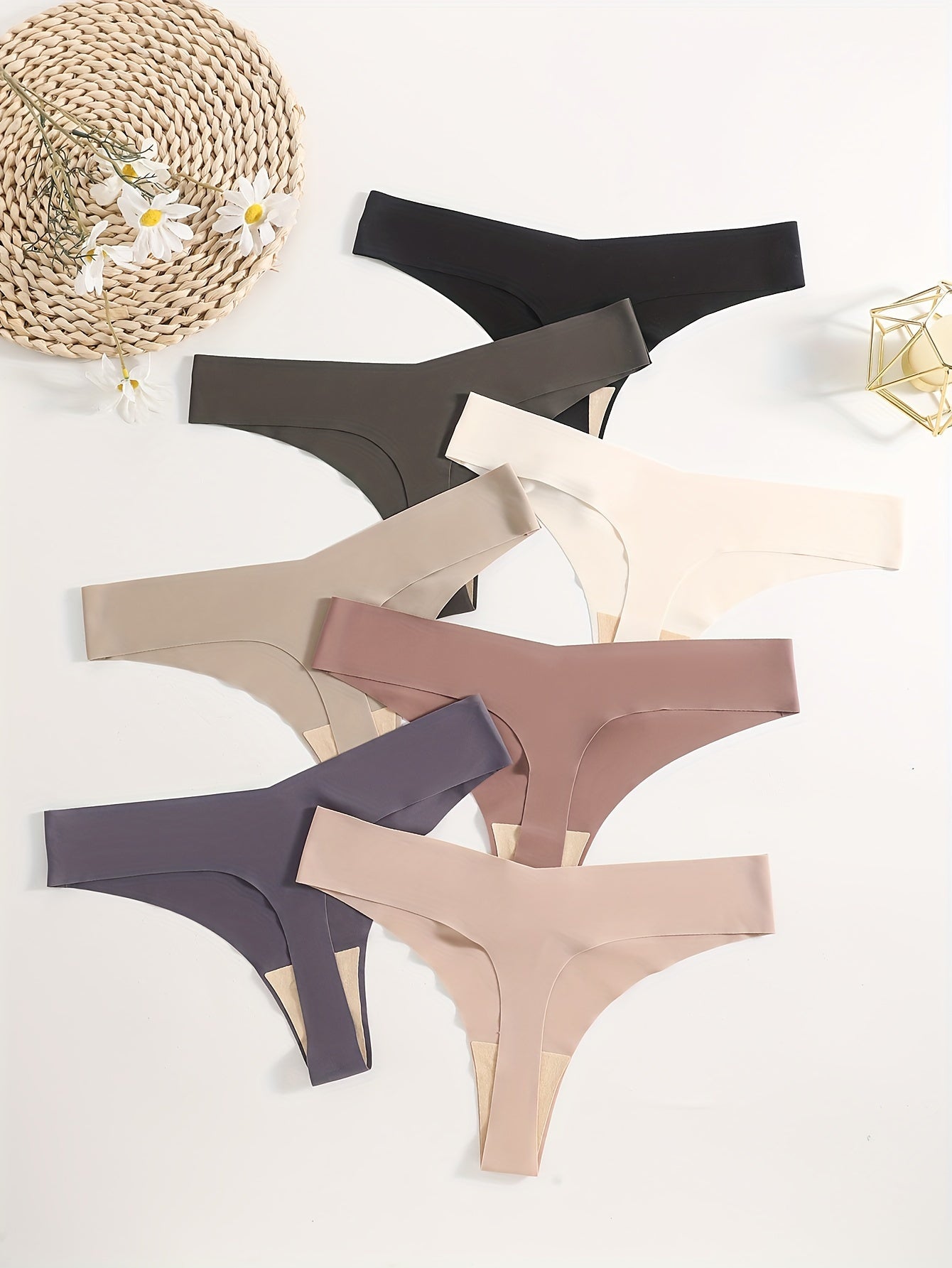 7 seamless solid thongs for women, soft and comfy intimates.