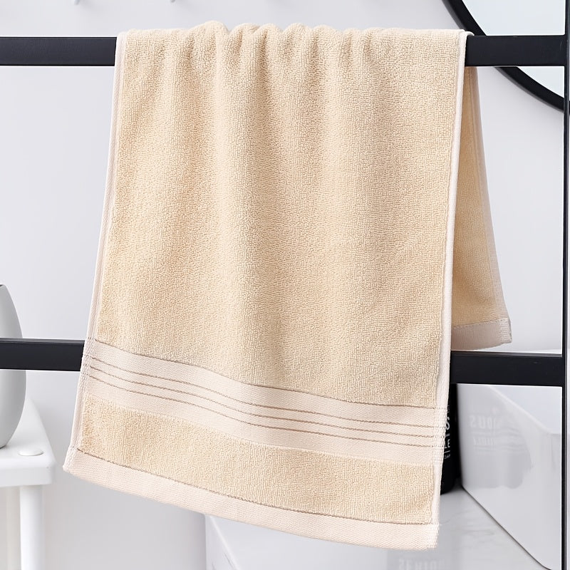 High-quality 100% cotton hand towels with modern striped pattern, 500 GSM, and super absorbent knit fabric. Suitable for bathroom, face, and hair. Perfect for home, hotel souvenirs, and holiday gifts.