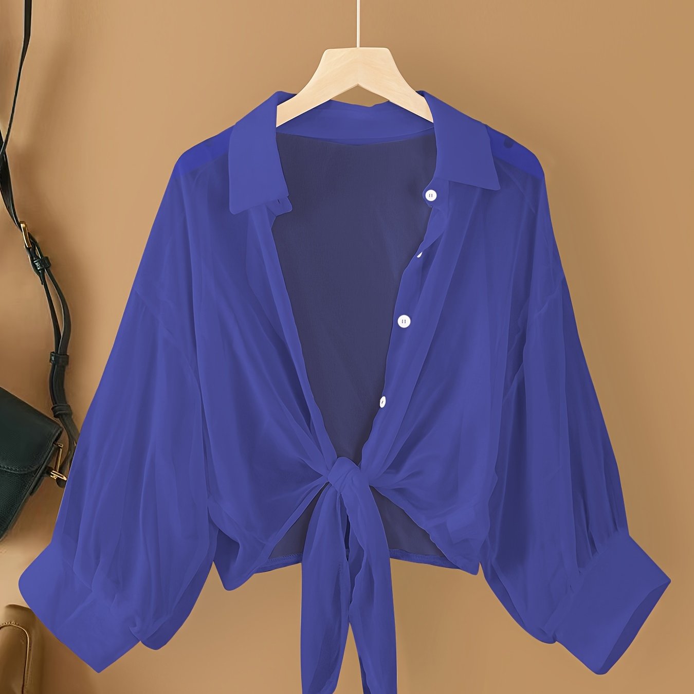 Women's casual chiffon cardigan with front bow detail and lapel collar, suitable for spring/summer/fall.