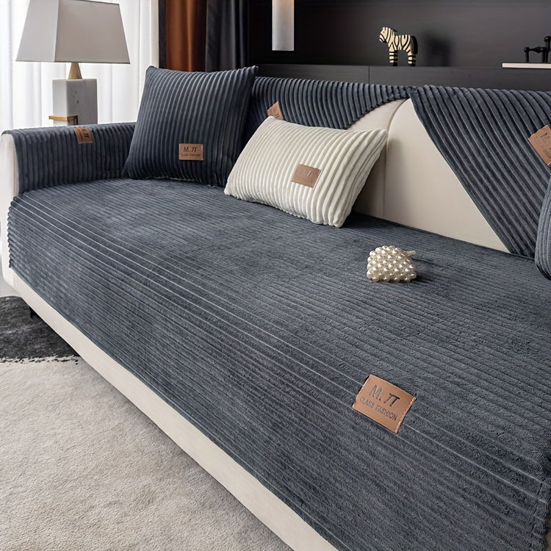 Luxurious plush sofa cover with label, thick and warm for winter. Pet-friendly, non-slip, modern design for living room, bedroom, or office decor.