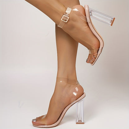 Stylish crystal clear block heel sandals with ankle strap, open toe, and rubber sole.