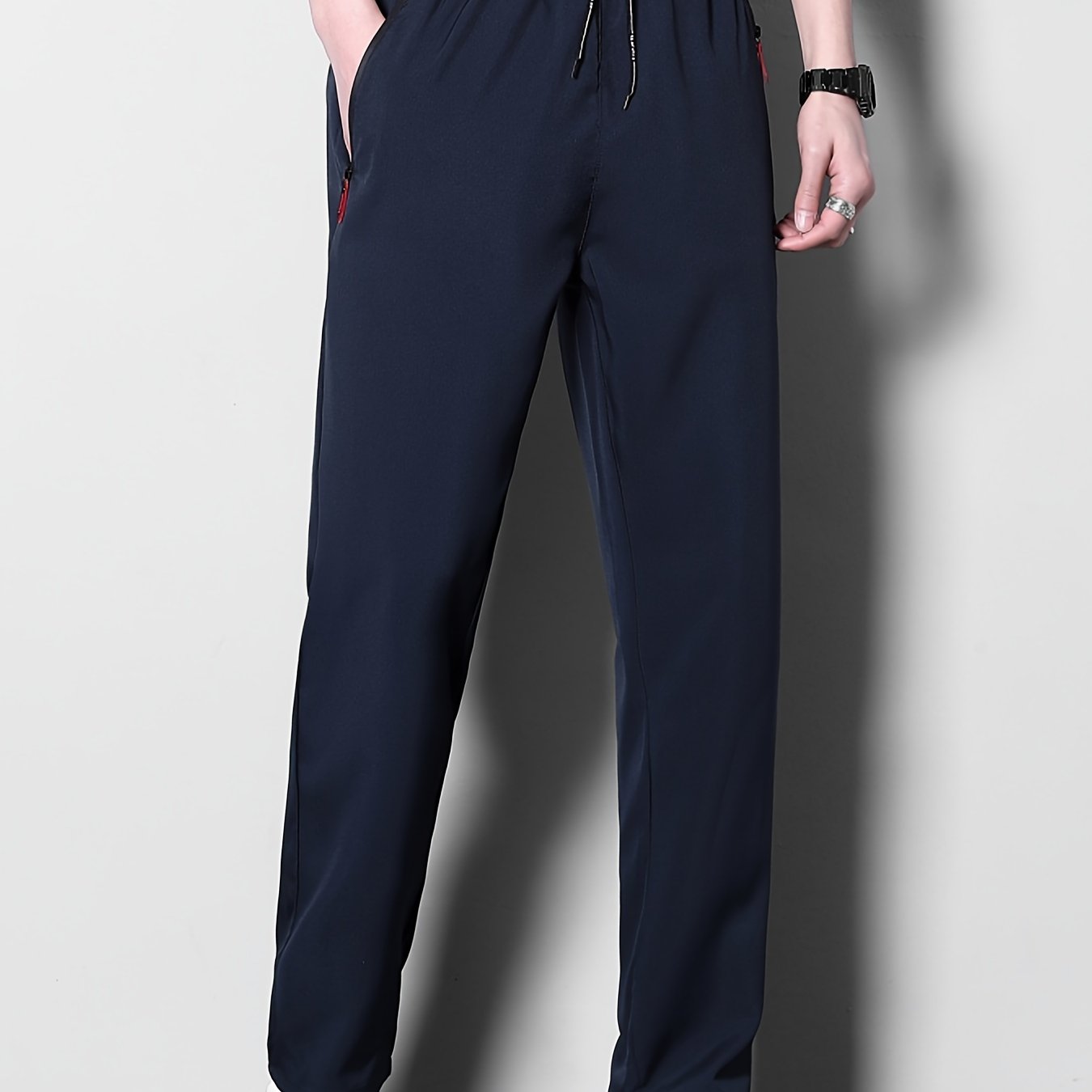 Men's breathable joggers, quick-dry athletic pants with zipper detail, machine washable.