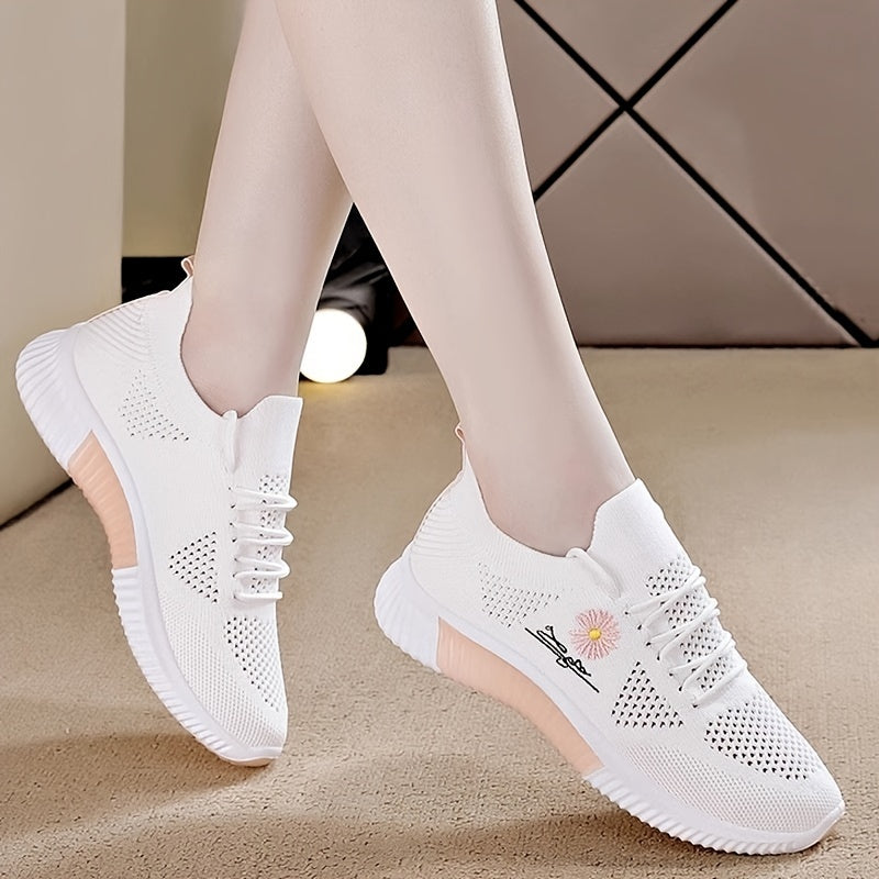 Women's breathable sneakers in chic white and pink with floral embroidery, lightweight and durable for outdoor activities.