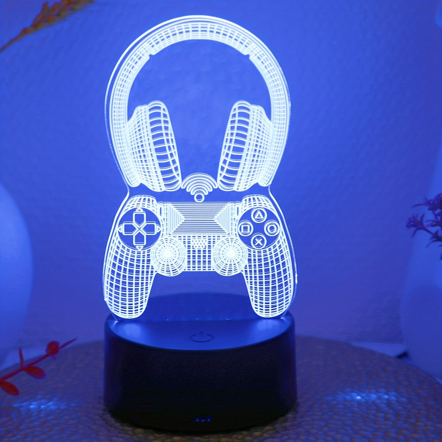 Novelty 3D night light with seven-color game headset handle design for bedroom and game room ambiance.