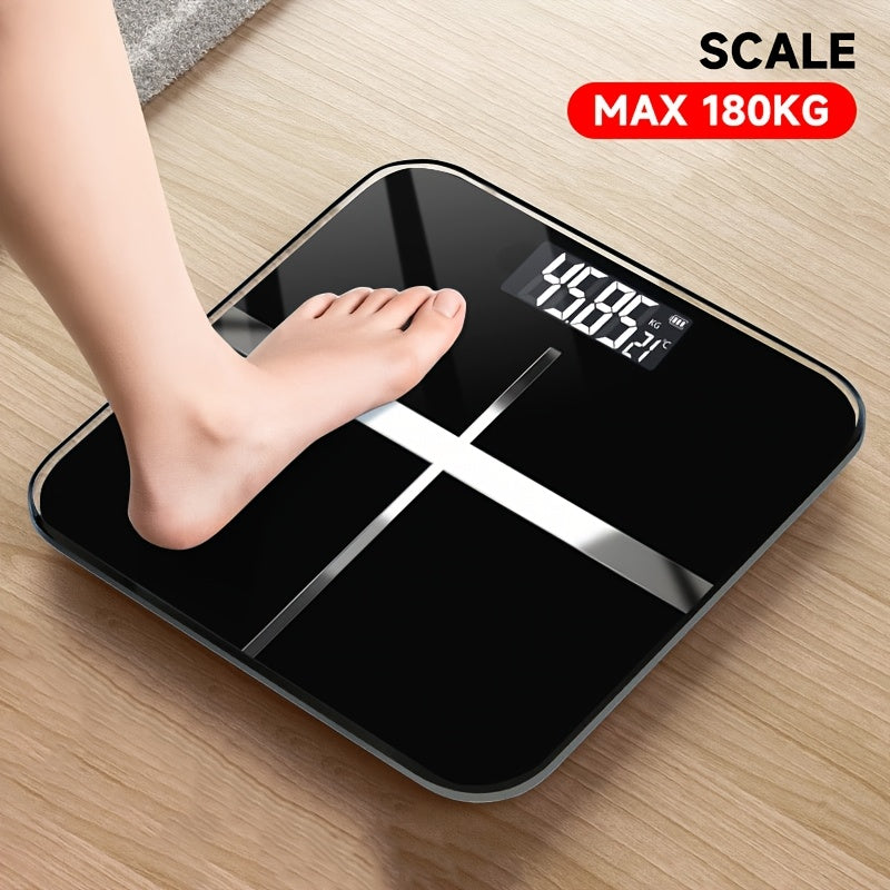 Modern black bathroom scale with 183.7 KG capacity, LCD display, sleek design for home use.