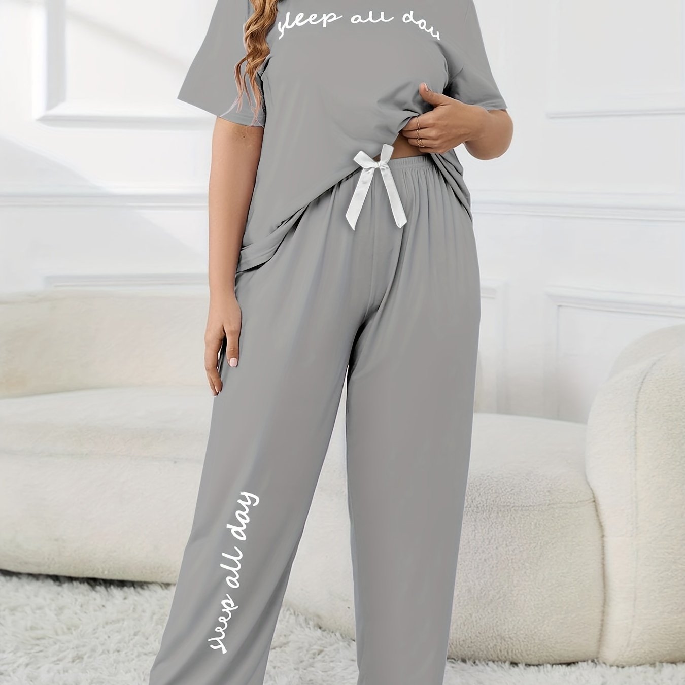 Cute plus-size pajama set with printed top and casual pants.