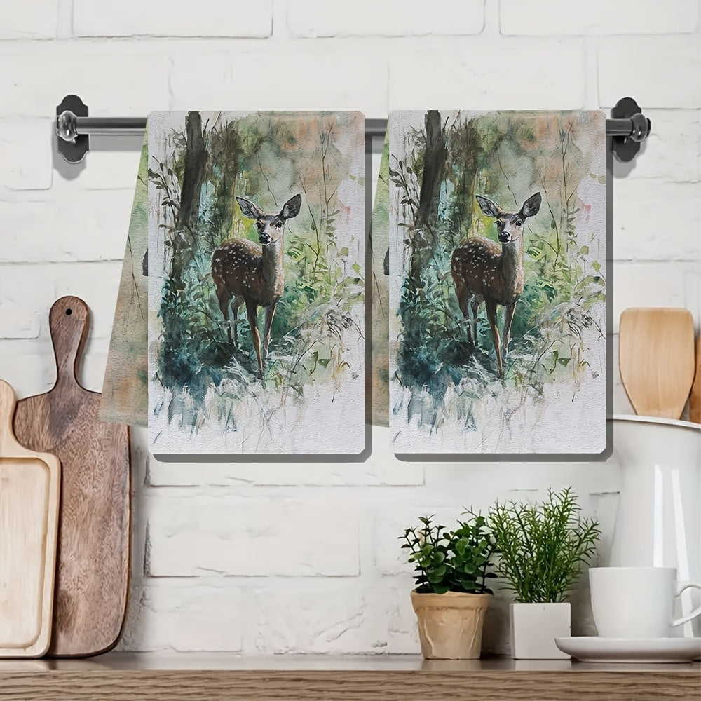 Two pieces of ultra soft kitchen towels featuring a graceful deer in underbrush design. These highly absorbent and machine washable dish hand towels are designed in a contemporary watercolor style, measuring 40.64x60.96 cm. Perfect for holiday decor and