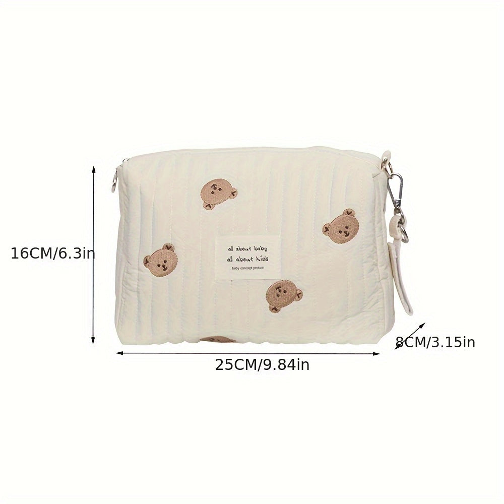 Stay organized on-the-go with this adorable Embroidered Diaper Clutch Bag designed for strollers. Made from durable polyester and featuring a quilted design, this pouch includes a secure zipper closure and cute floral embroidery. Perfect for ages 14 and