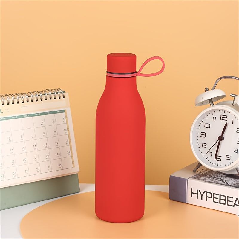 Stainless steel vacuum insulated water bottle with carrying handle, leak-proof design, and 500ml capacity, perfect for outdoor activities and gifts.