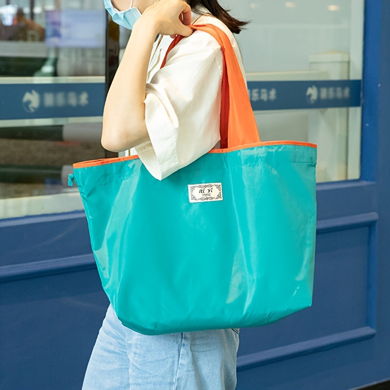 One-piece Large Drawstring Supermarket Shopping Bag with Multiple Options - a Fashionable Shoulder Bag that is Foldable, Compact, and Portable. Made of Waterproof Oxford Cloth, perfect for Grocery Shopping and stylish enough for everyday use.