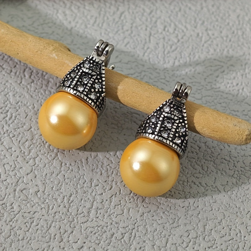 Vintage Bohemian-inspired drop earrings in stainless steel, adorned with rhinestones and faux pearls, ideal for a casual chic look.