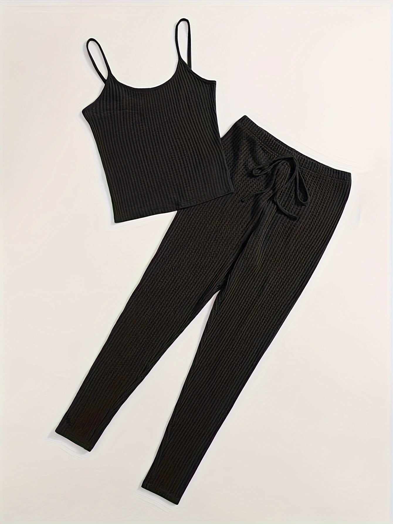 Comfortable lounge set for women, including cami top and tie front pants.