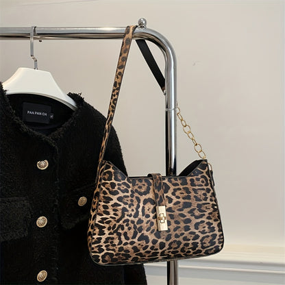 Leopard Print Shoulder Bag with classic clasp, PU strap, zip closure, and faux leather lining.