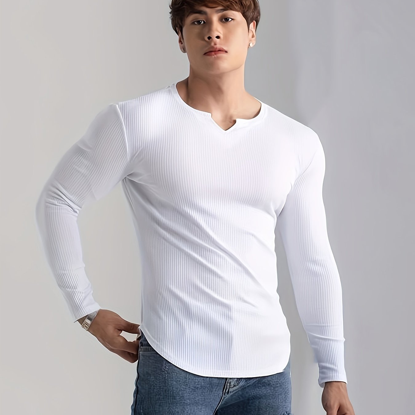 Men's solid color long sleeve V-neck t-shirt for comfortable and casual wear in spring and fall outdoor activities.