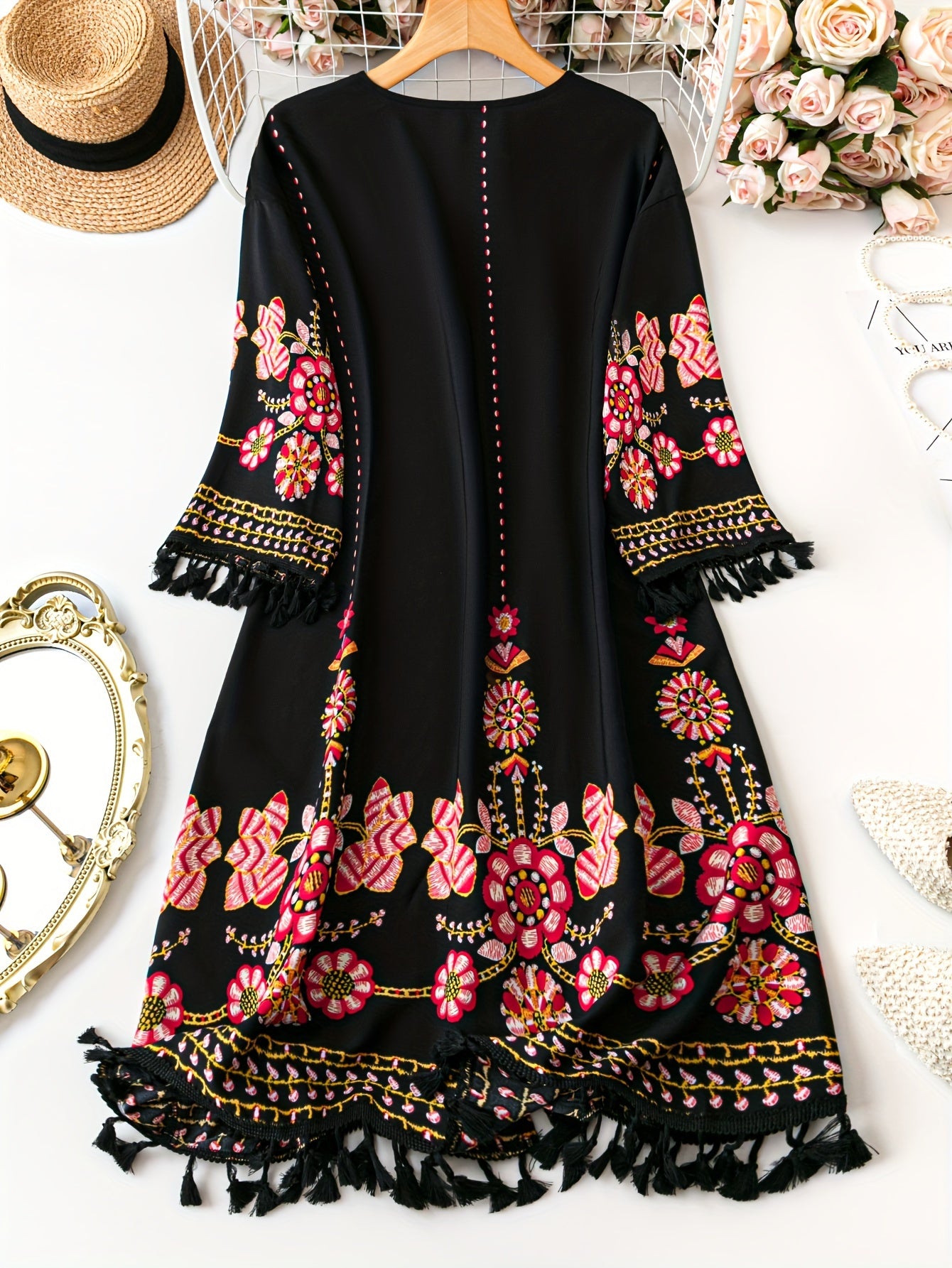 Stylish plus size floral tassel cardigan made of sheer polyester, perfect for spring/summer.