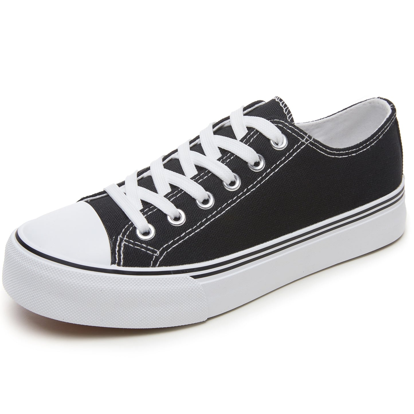 Black and white low top lace-up sneakers for women with rubber sole, fabric lining, and durable outsole for all-day comfort. Casual footwear with sleek design and fabric upper.