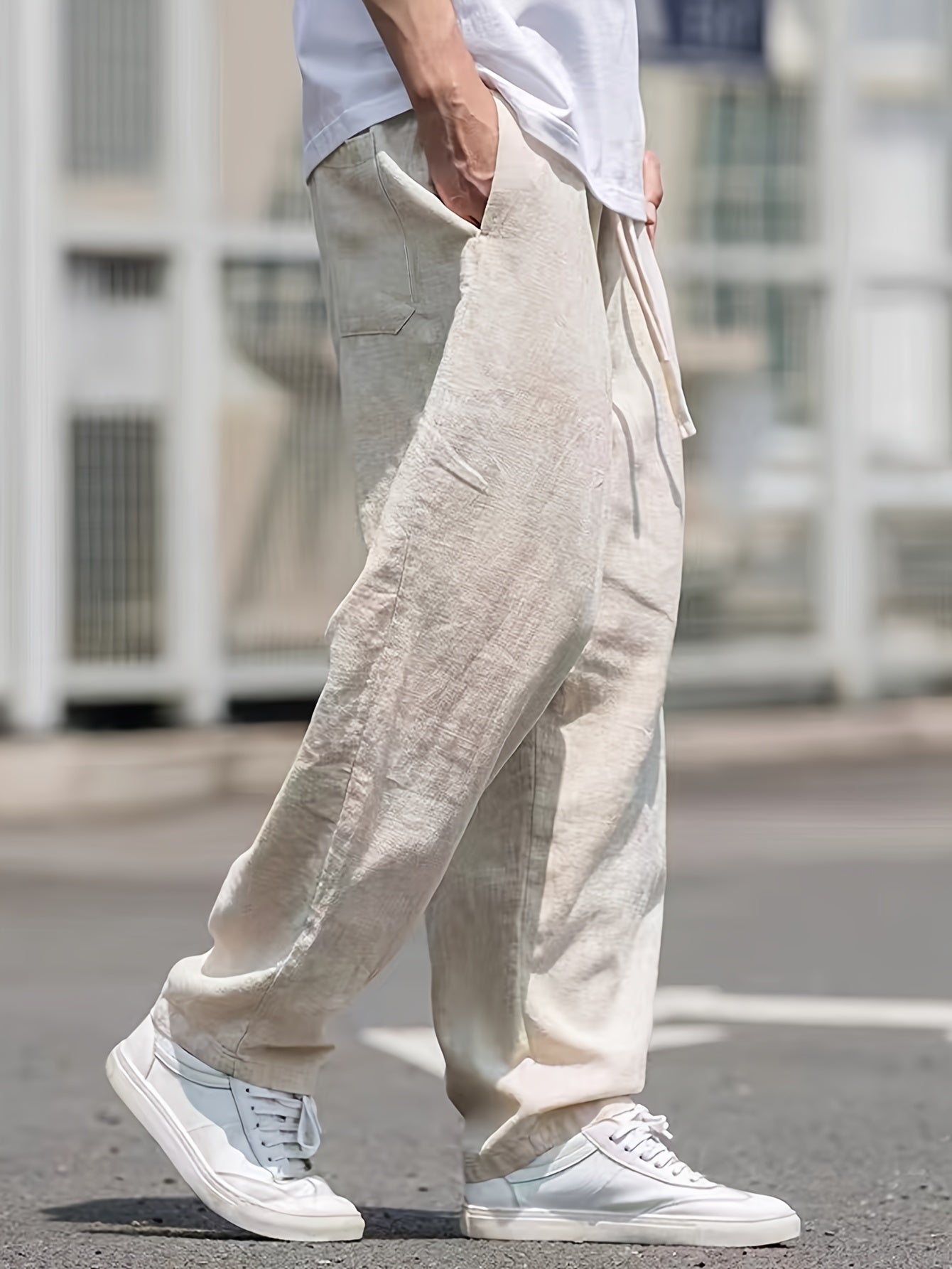 Street style drawstring trousers for men with a loose fit.