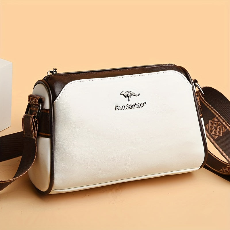 Water-resistant crossbody bag for women with adjustable strap, zipper closure, and polyester lining.