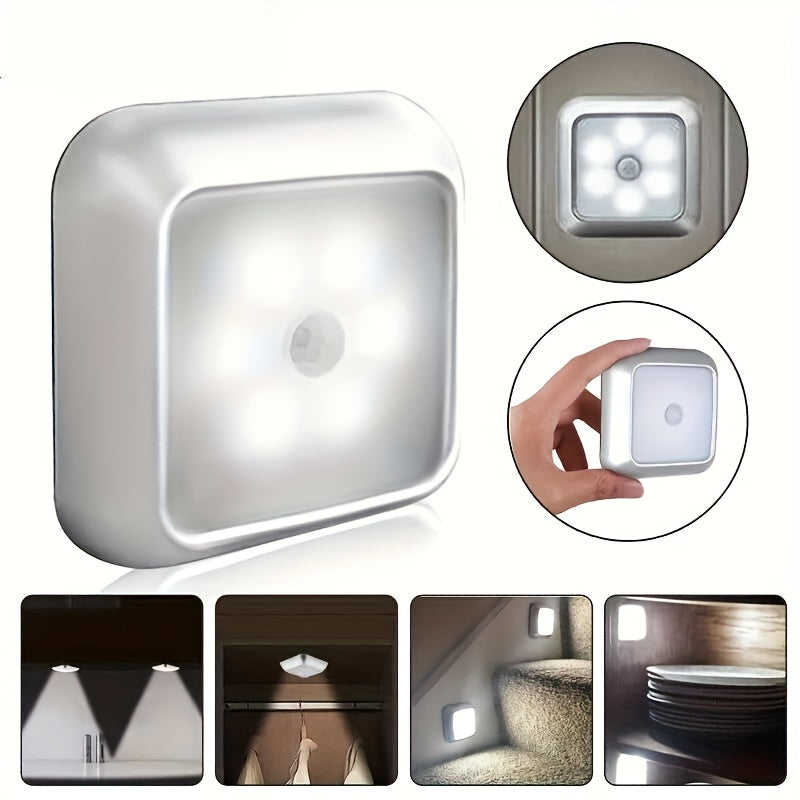 Sleek white night light with motion sensor and adjustable brightness, ideal for cabinets, wardrobes, and bathrooms. Easy installation and cordless design.