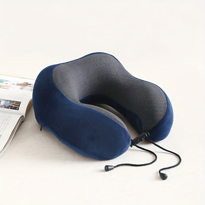 Ergonomic memory foam U-shaped travel pillow for comfortable sleep on airplanes and long journeys. Adjustable, reversible neck support cushion in medium firmness, available in red, blue