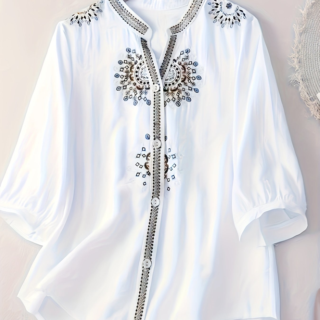 Embroidered short sleeve blouse with stand collar for women, made of breathable polyester, machine washable, semi-sheer.