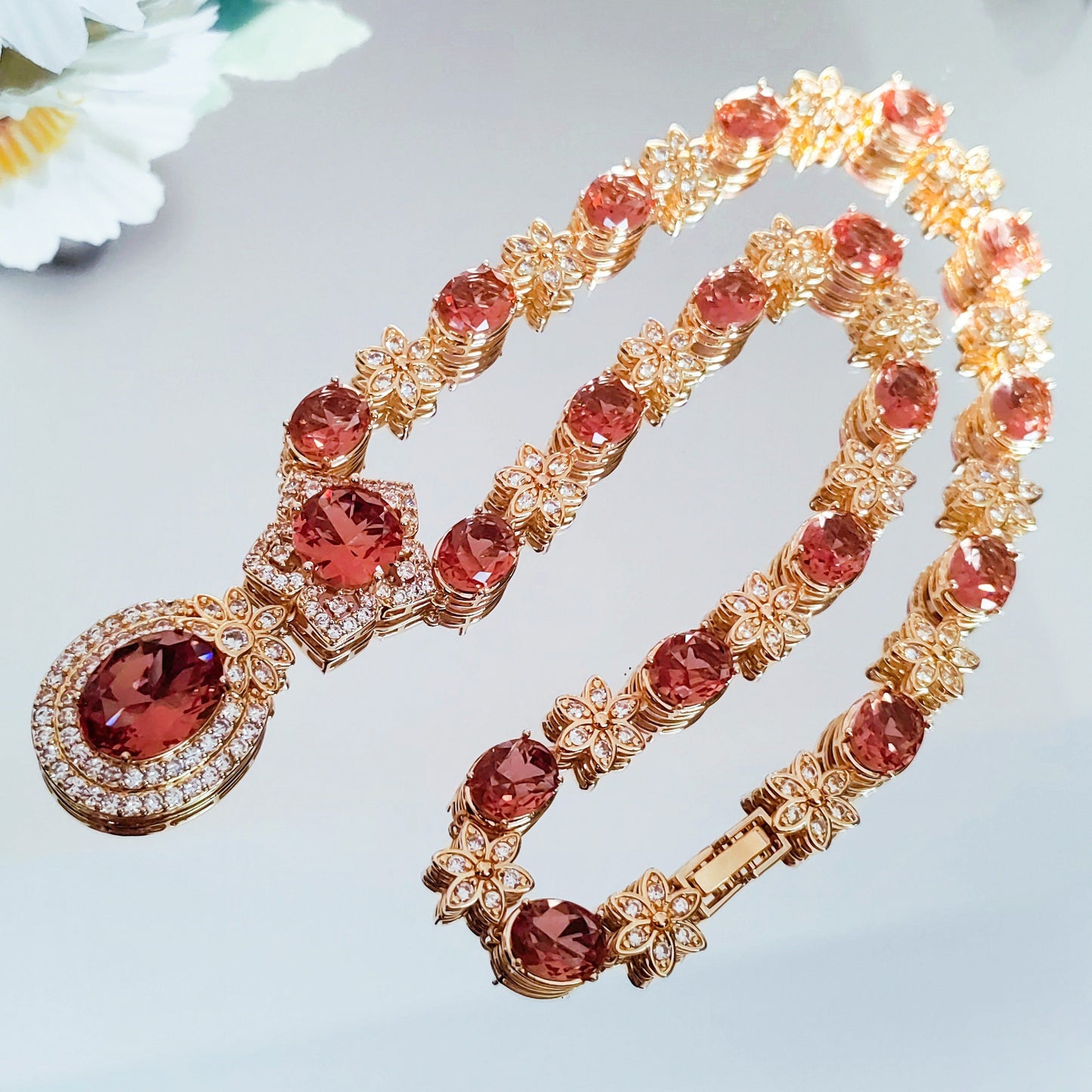 Introducing the MEETMAY Synthetic Color Changing Sultanite Diaspore Oval Sunflower Jewelry Set. This elegant copper-tone four-piece set includes a ring, earrings, bracelet, and necklace. The colors are customizable to adapt to different lighting