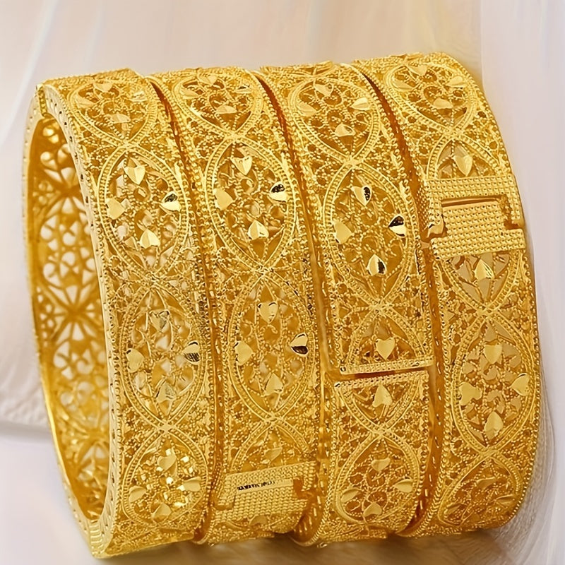 A pack of 4 Dubai bracelets in popular Middle Eastern style, plated with 24k gold. These fashion-forward and versatile bracelets are perfect for weddings or everyday wear. The set includes a classic hollow ring surrounded by love-themed designs, creating