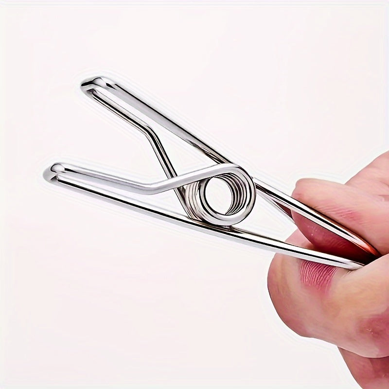 20-piece stainless steel clothes pegs for various purposes in the laundry, kitchen, office, and outdoor activities.