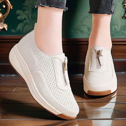 Beige perforated women's casual sneakers with zipper detail, thick sole, and anti-slip features.