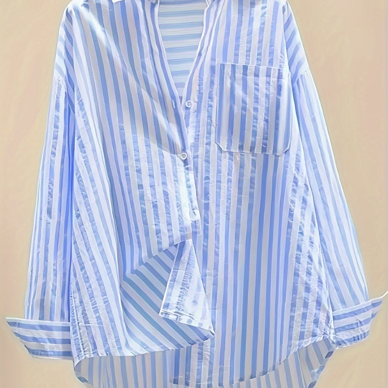 Women's blue and white striped long sleeve button-up shirt with collar, chest pocket. Made of lightweight polyester, machine washable. Suitable for all-season casual or dressy wear.