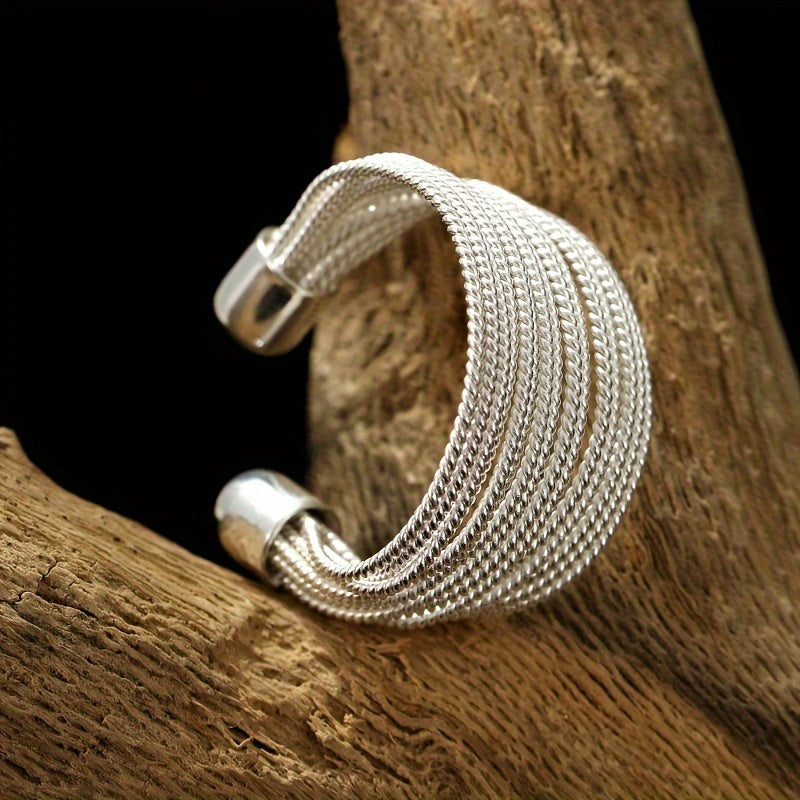 Elegant and light-weight, this open design multi-line ring for women is made of 925 silver and features a simple Korean style. In a beautiful golden color, this hand accessory weighs just 5g/0.18oz.