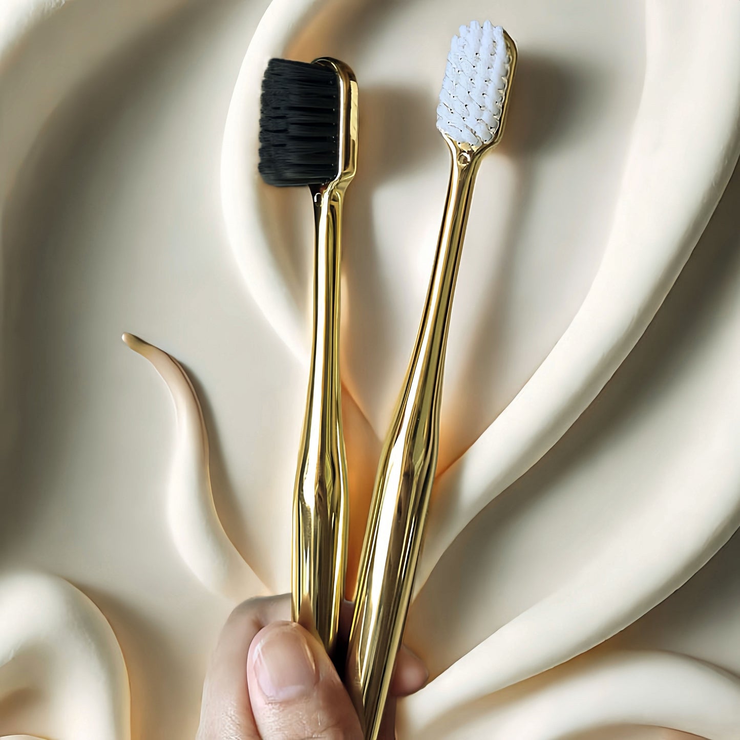 High-end gold and silver plated toothbrush with bamboo charcoal fiber bristles for deep cleaning oral care; individually packaged for couples or adults.